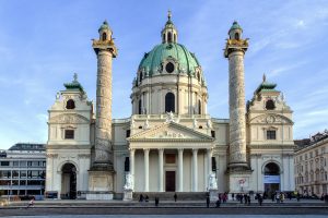 white-concrete-churchpeople-under-blue-sky-161074